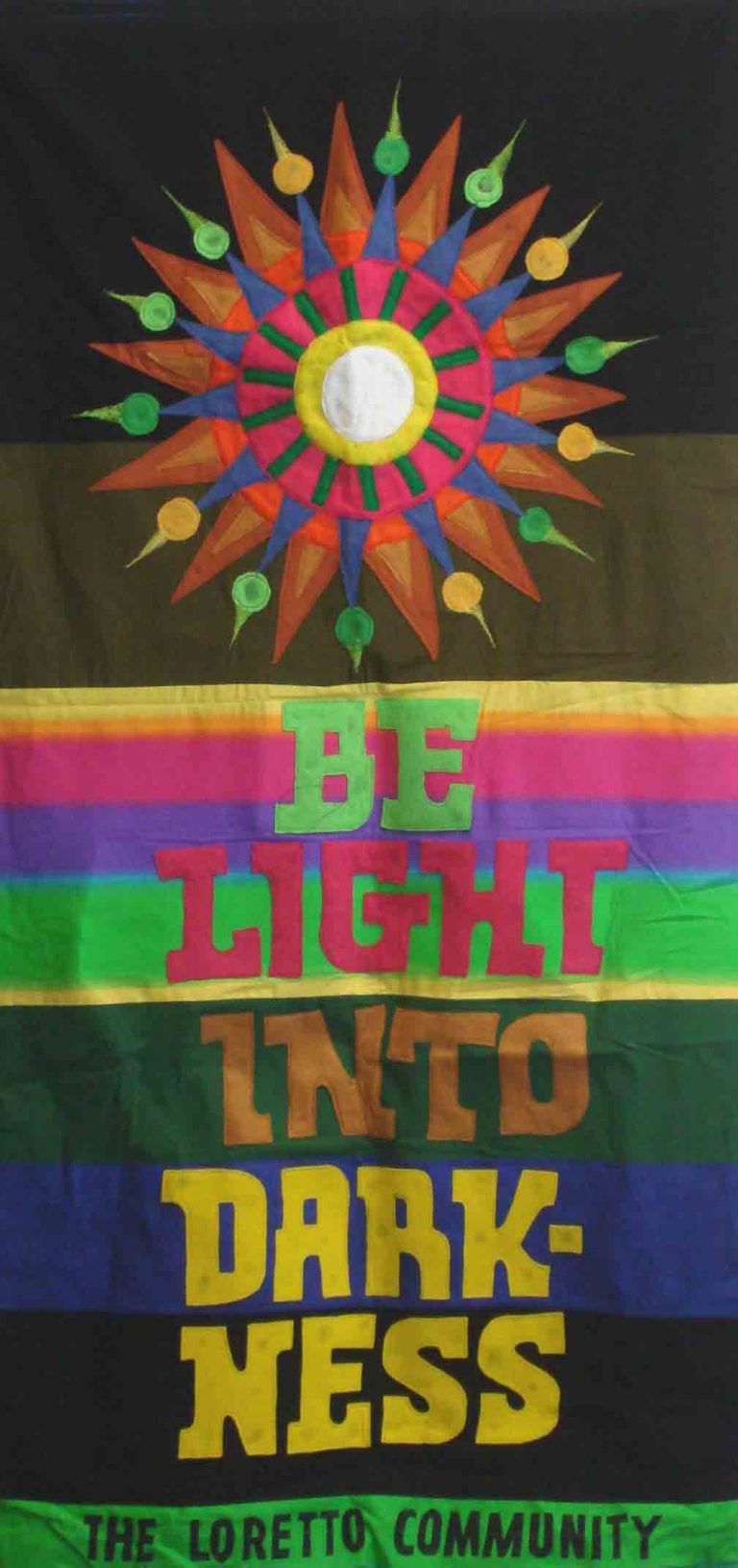 Banner designed by Robert Strobridge with starburst and phrase "Be Light Into Darkness."