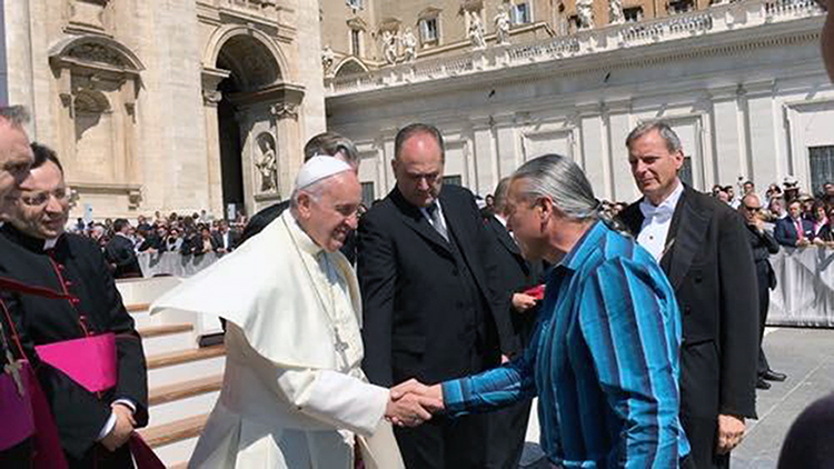 Pope Francis greets author, co-founder and co-director of Indigenous Law Institute Steven Newcomb on a recent visit to Rome. (Photo by William Laronal Jr.)