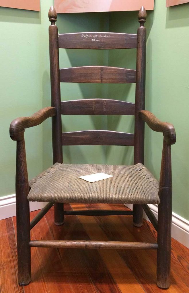 Oak chair with woven seat which belonged to Father Charles Nerinckx, founder of Loretto.