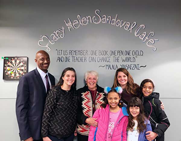 Members of Mary Helen Sandoval’s family gather at her recognition ceremony at the Colorado High School Charter. Back row, from left, are Kelvin Reed, Andrea Sandoval Reed, Mary Helen Sandoval, Amanda Sandoval and Ariel Sandoval Reed. Front row, from left, are Malia Sandoval Reed and Aziza Halpern Sandoval.(Photo by Jackie Coppola)