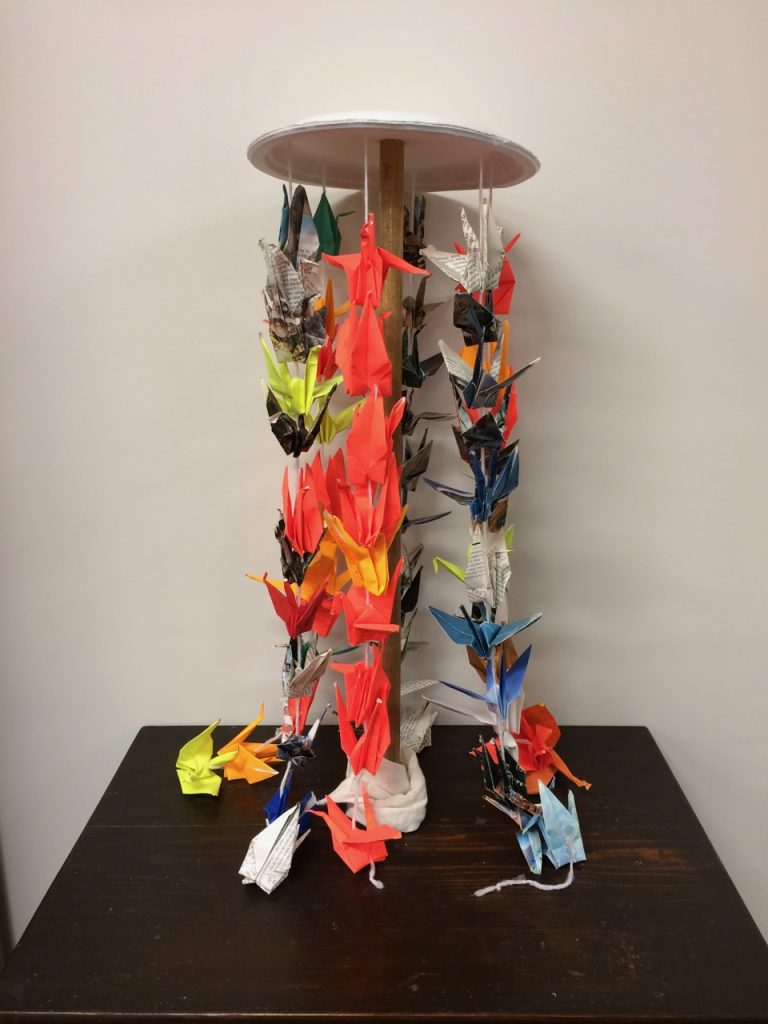 Display of strings of origami cranes