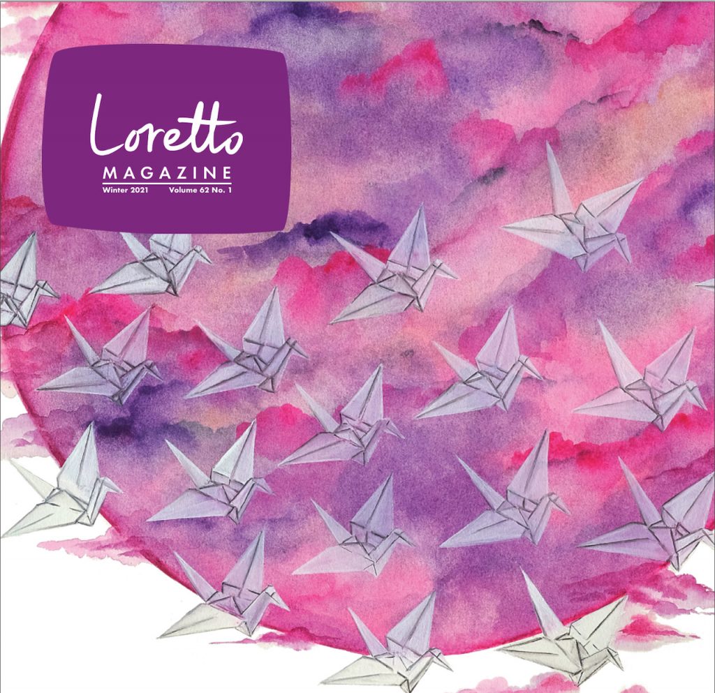 A flock of paper cranes floats in front of a multi-colored circle of pinks and purples