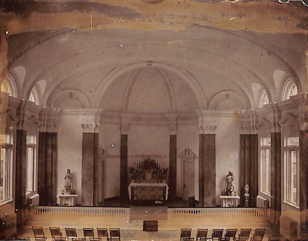 Historical photo of simple interior of chapel.