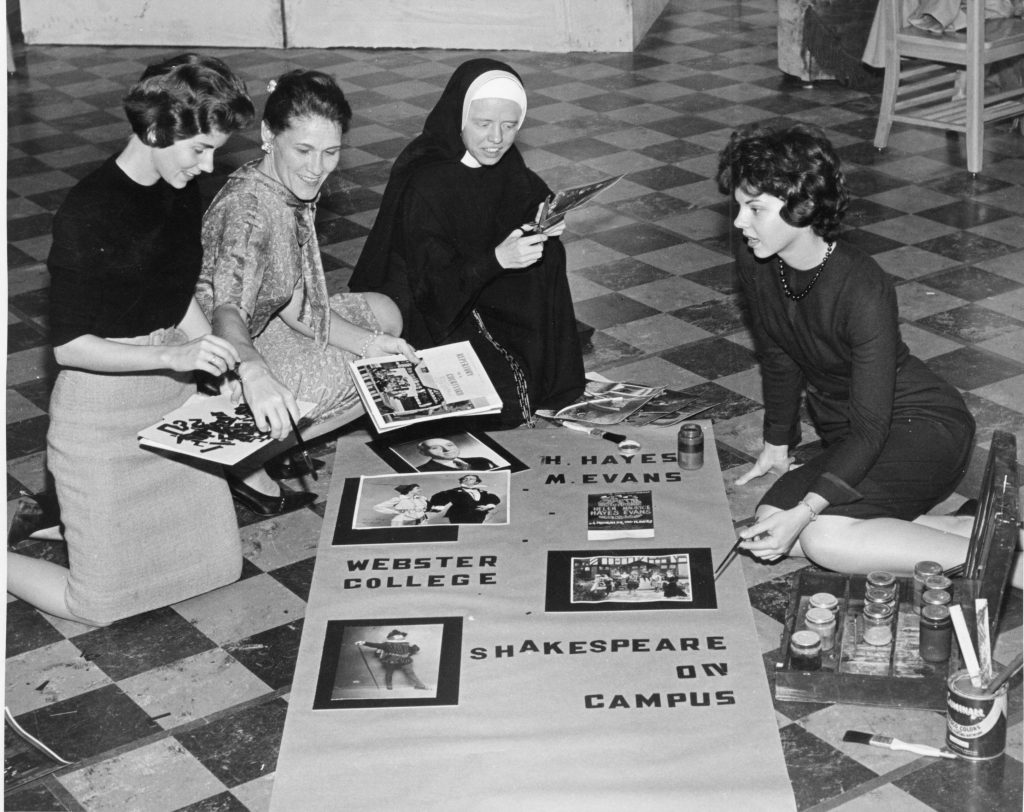 Archival photo of Loretto sister making a poster with students