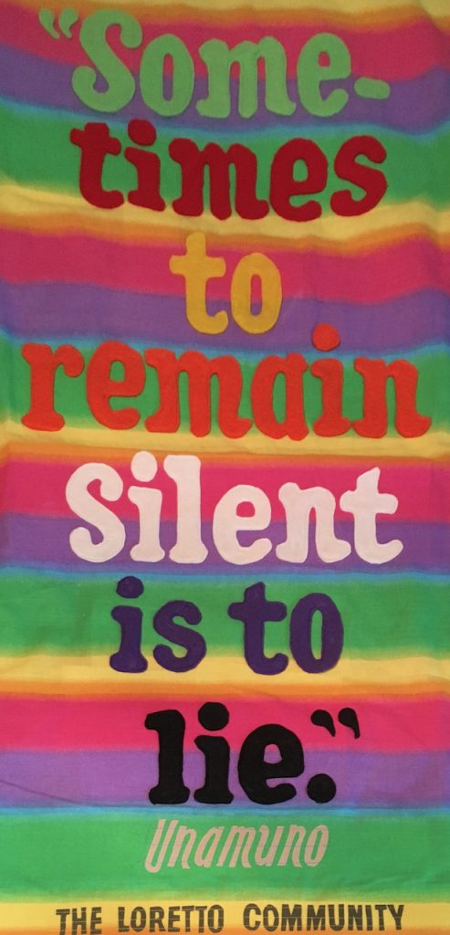 Colorful banner featuring the Unamuno quote "Sometimes to remain silent is to lie." Banner by Robert Strobridge CoL