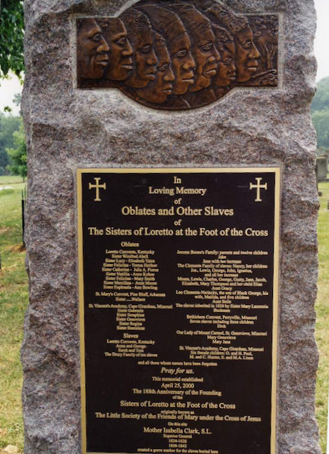 Stone memorial to enslaved persons held by Loretto.