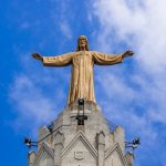 statue of christ the king under blue sky