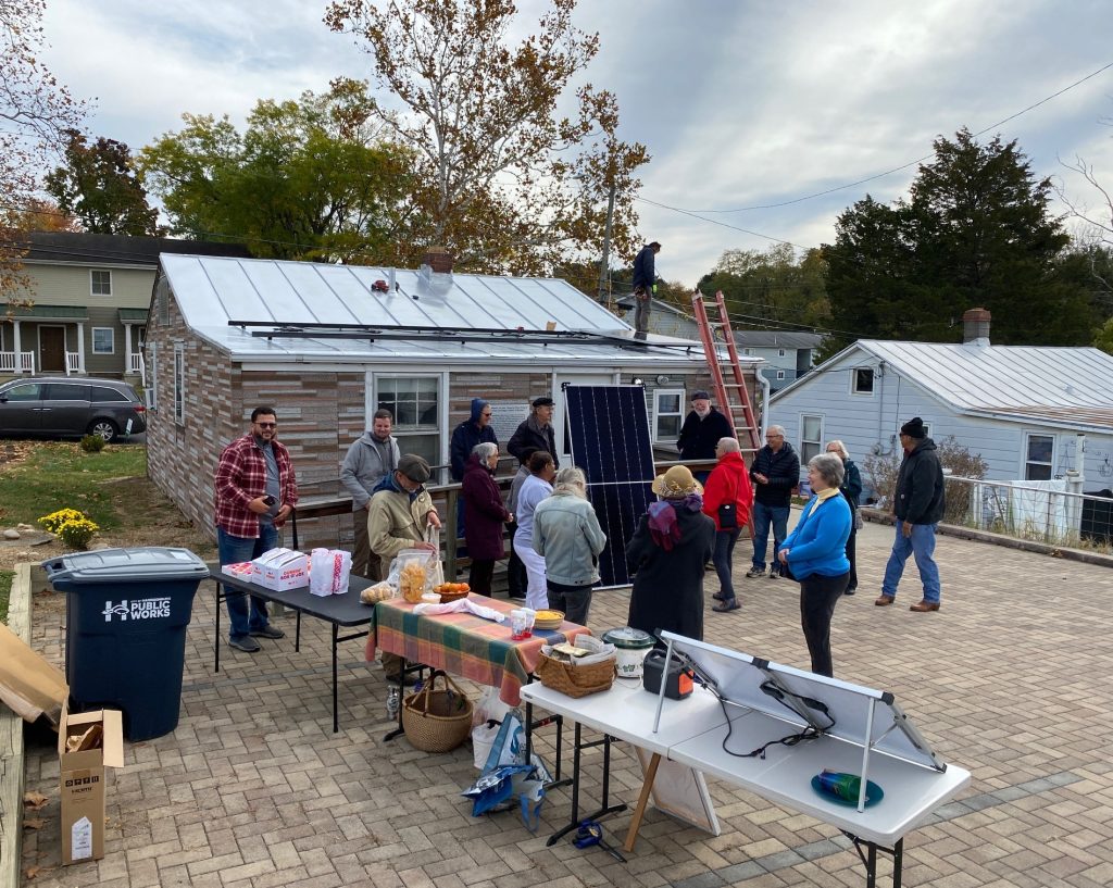 The Shenandoah Valley Black Heritage Center holds a picnic to celebrate the solar installation. Notice the Crockpot connected to table-top solar panels. Photo by Jeff Heie.