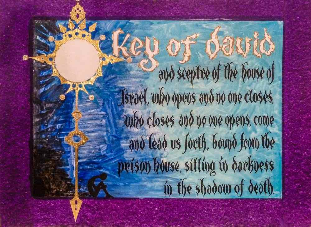 Colorful art print reads "O Key of David and sceptre of the house of Israel, who opens and no one closes, who closes and no one opens, come and lead us forth, bound from the prison house, sitting in darkness in the shadow of death."