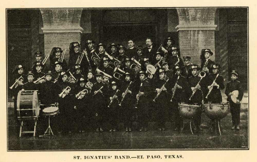 Archival formal photo of marching band.