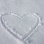 Heart, love symbol on beach