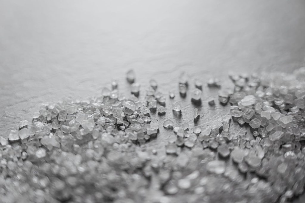 photo of salt on white surface