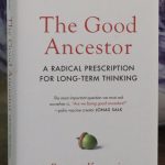 A book cover titled "The Good Ancestor: A Radical Prescription for Long-Term Thinking by Roman Krznaric"