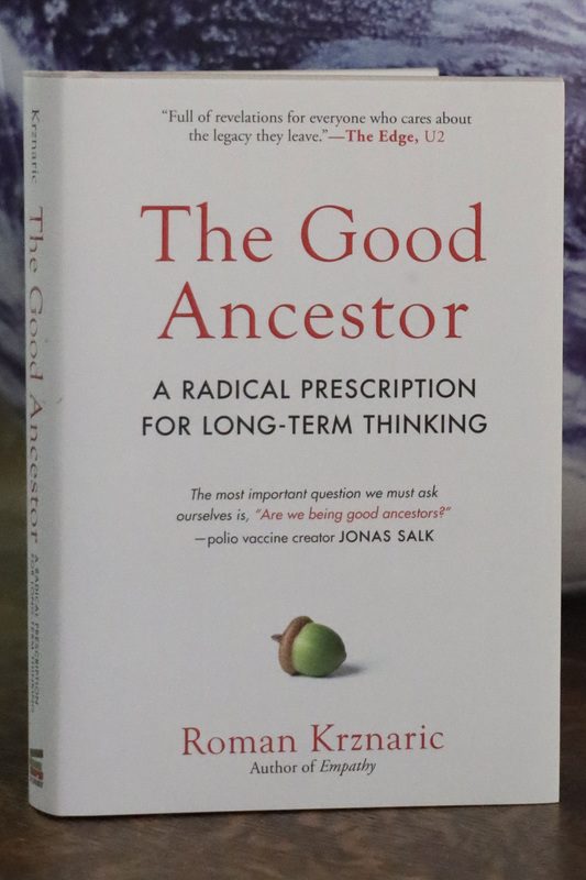 A book cover titled "The Good Ancestor: A Radical Prescription for Long-Term Thinking by Roman Krznaric"