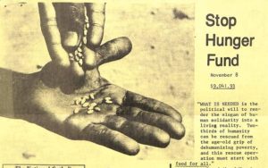 A photo of an old publication that shows the words "stop hunger fund" next to a photo of a hand putting seeds into another hand
