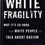A simple black book cover with white text with the title: White Fragility: Why it's so hard for white people to talk about racism
