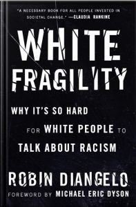 A simple black book cover with white text with the title: White Fragility: Why it's so hard for white people to talk about racism