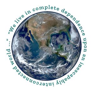 A circular photo of the earth from space with the text "We live in complete dependence upon an inescapably interconnected world..." wrapped around it.