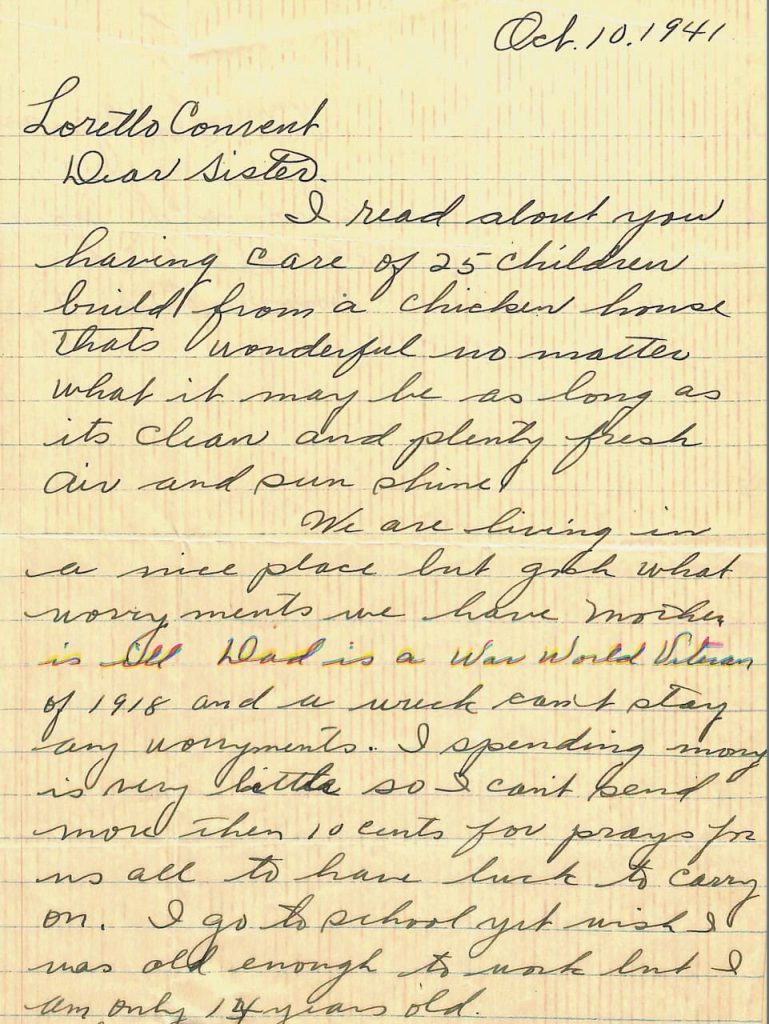 A letter written in cursive is on lined school paper written in 1941