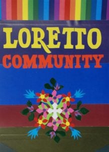 Brightly colored banner with rainbow stripes across the top, the words "Loretto Community" in large yellow and red letters and a stylized bouquet at the bottom.