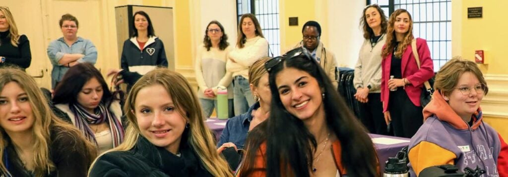 A photo of a group of St. Mary's Academy students participating in a Commission of the Status of Women teen orientation.