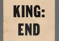 Placard reading "Honor King: End Racism!"